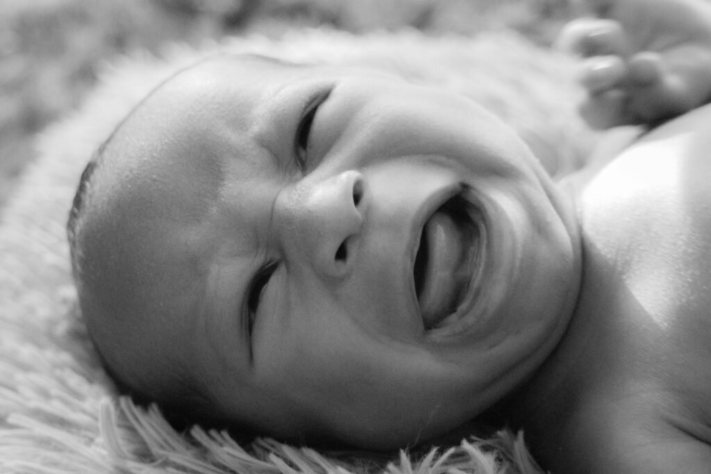 Irritated baby with sleepiness